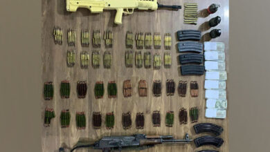 Photo of Huge cache of arms, ammunition recovered from vehicle in Qazigund; two arrested